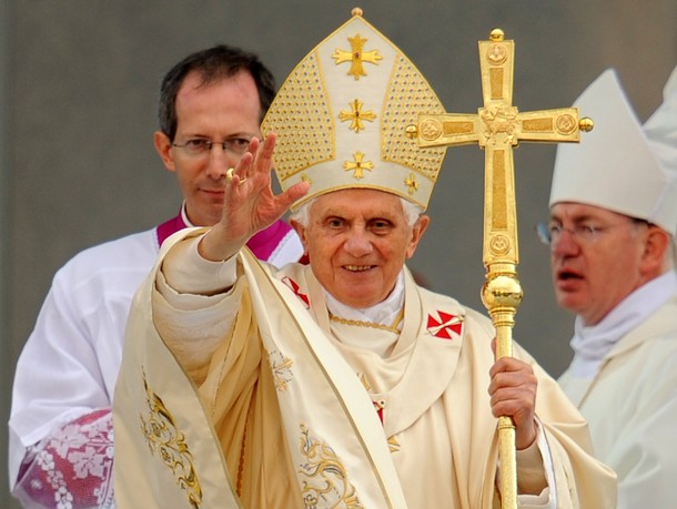 Pope Benedict XVI waves as he conducts a